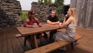 3 people at picnic bench participating in our program